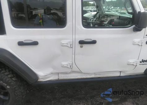 2021 Jeep Wrangler Unlimited Willys 4X4 z USA, uszkodzony, nr VIN 1C4HJXDG8MW597448